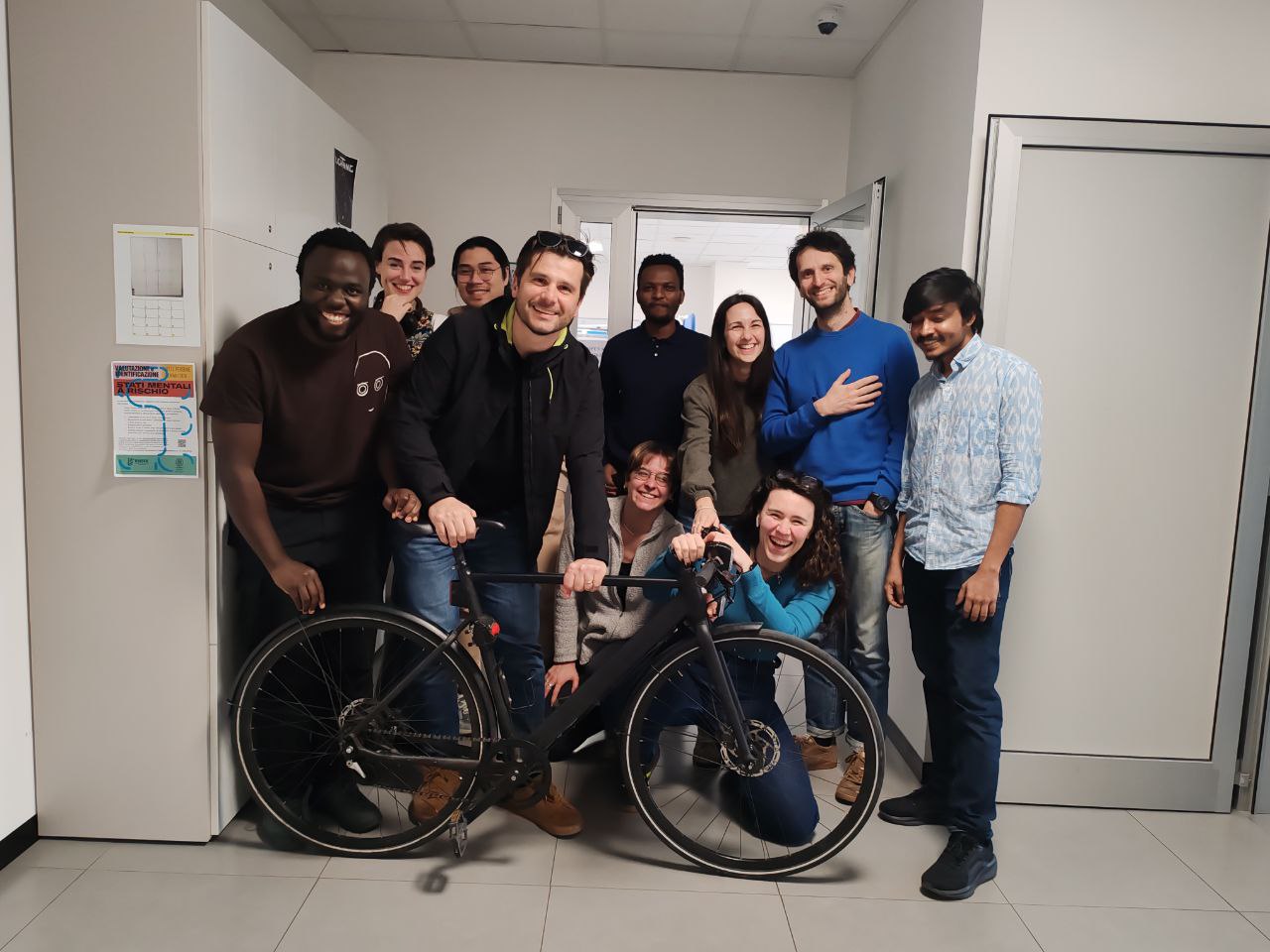 CARISMA team members celebrating the finding of Alessandro bike